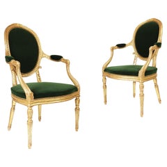 Un'eccezionale coppia di poltrone in legno dorato di Giorgio III, 1765 circa, attribuite a