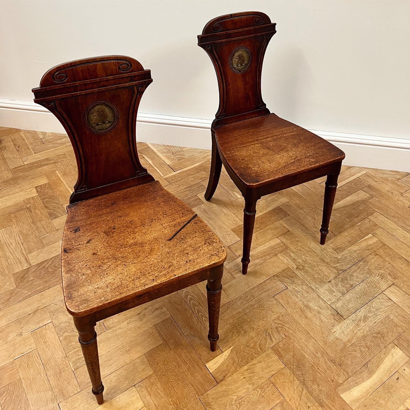 British Exceptional Pair of Regency Mahogany Hall Chairs For Sale