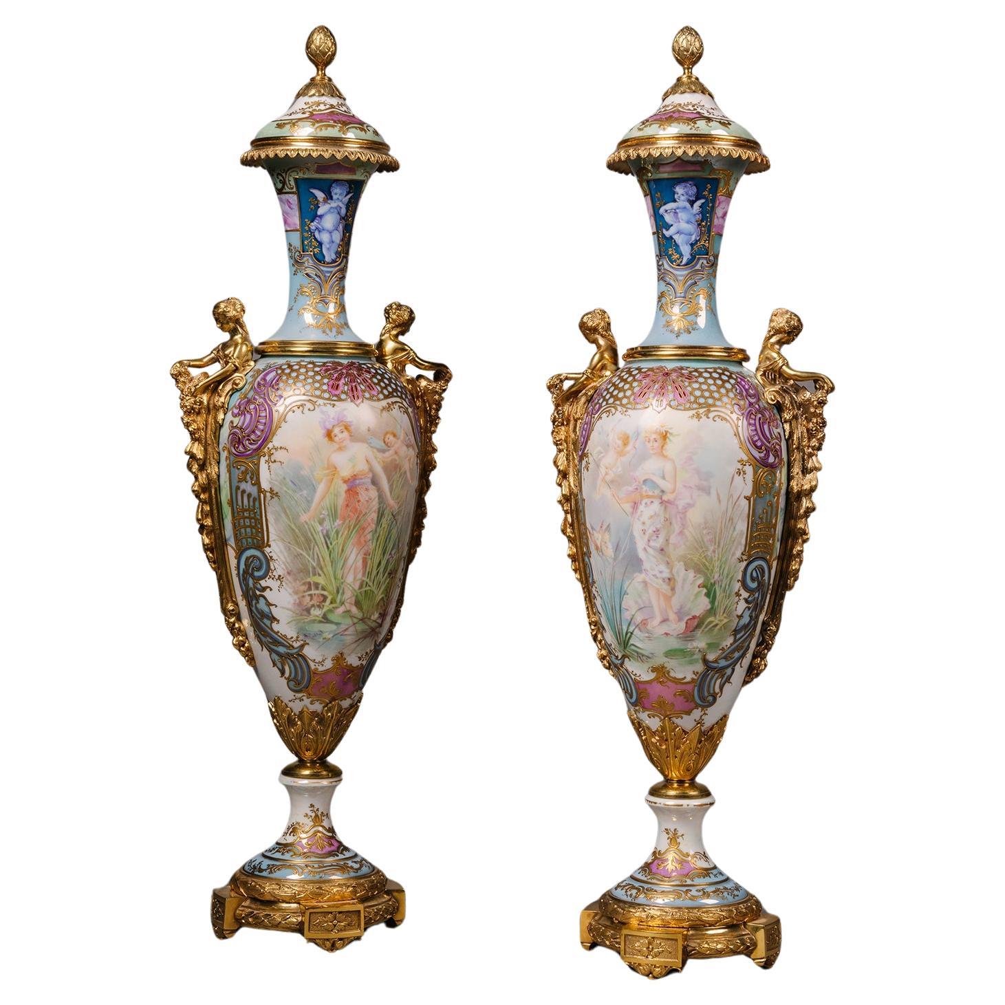 An Exceptional Pair of Sèvres Style Iridescent-Ground Porcelain Vases and Covers