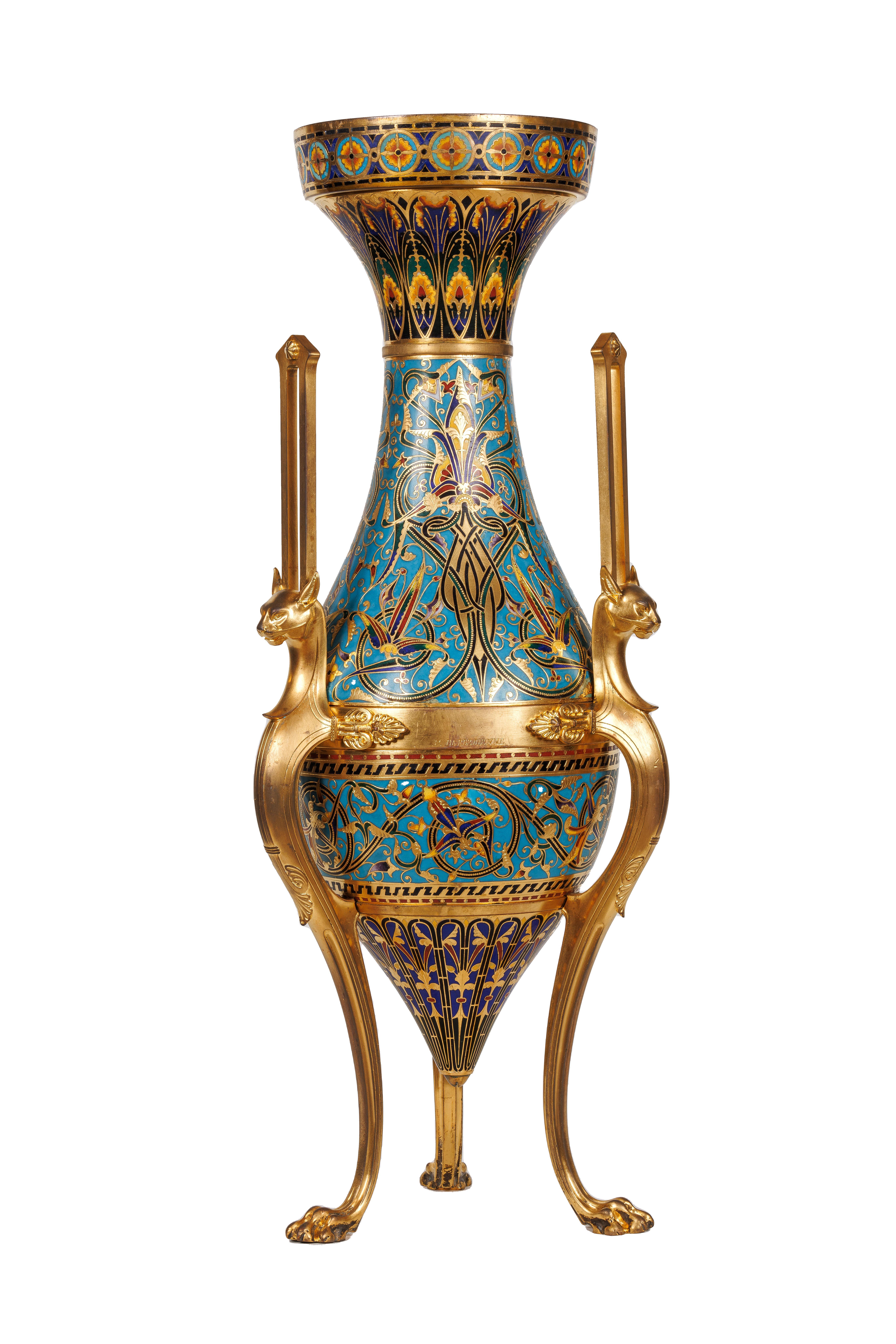 An exceptional pair of French Ormolu and Champleve Enamel vases by Louis Constant Sevin and Ferdinand Barbedienne, circa 1860.

