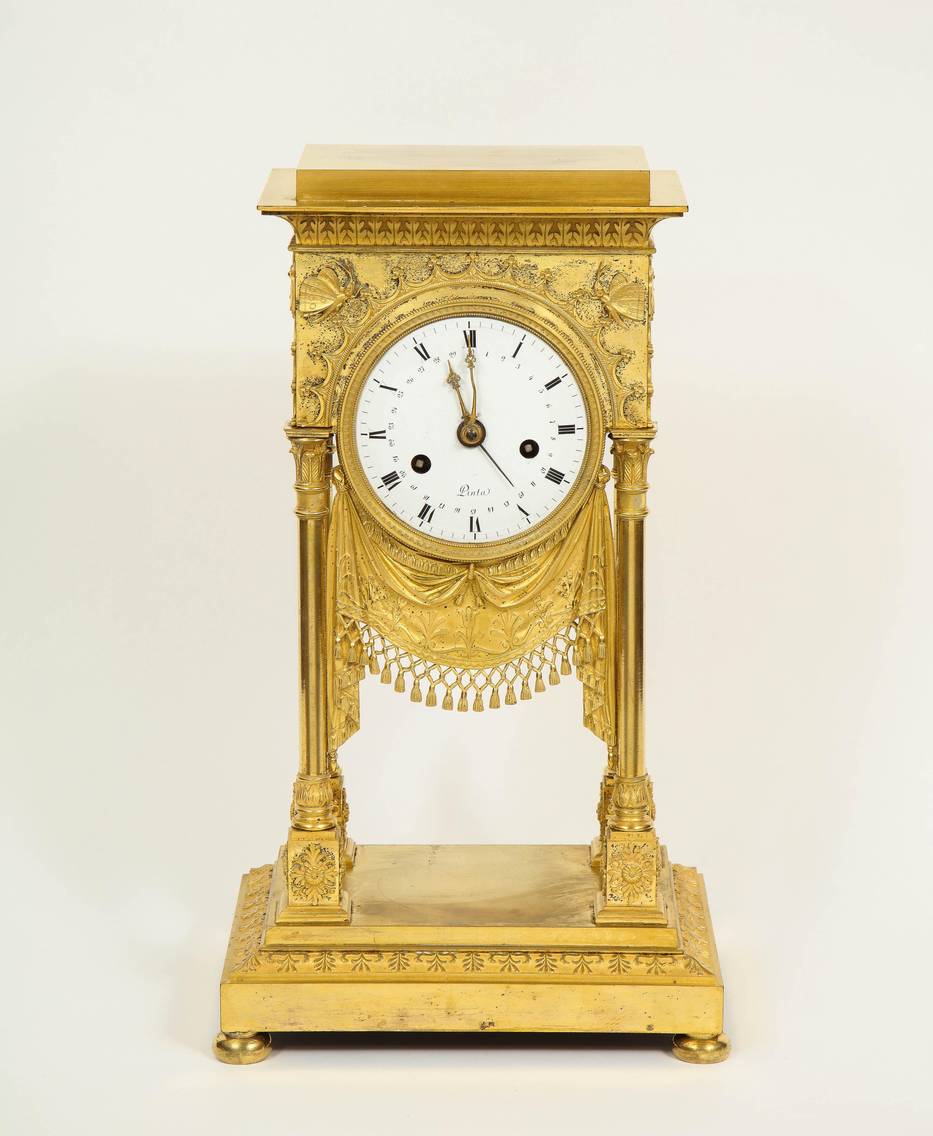An exceptional quality French ormolu clock with dragonflies, circa 1830.

This French clock is so elegant and unique. The ormolu is mercury gilding, extremely bright and crisp.
Each top corner has a dragonfly which is very unusual and quite