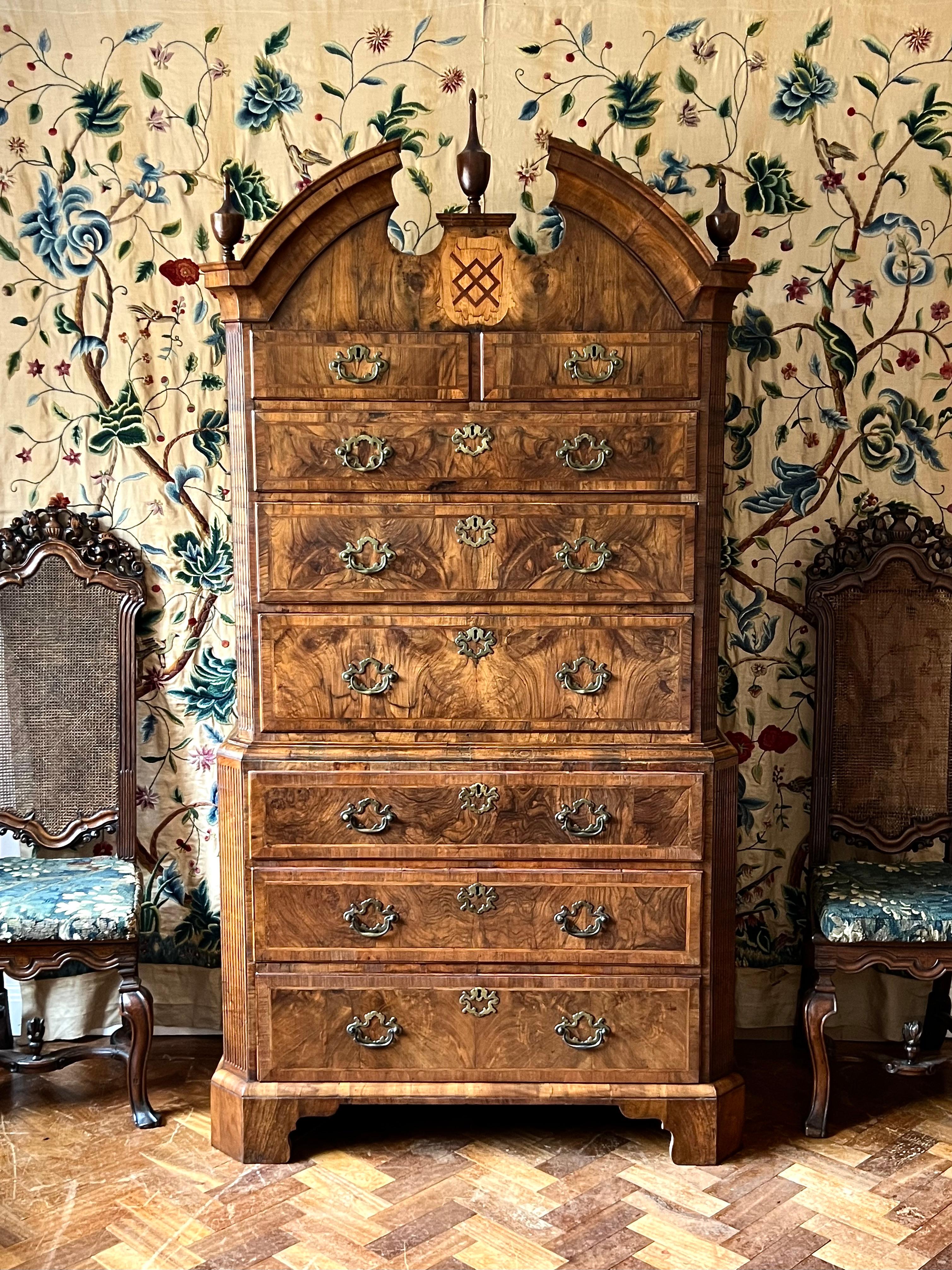 A remarkable English Queen Anne period burr walnut tallboy, ca 1710.

From a private Scottish estate. This provenance adds further weight to its Masonic association.

Walnut tallboys, when of this architectural form and proportions, have always been