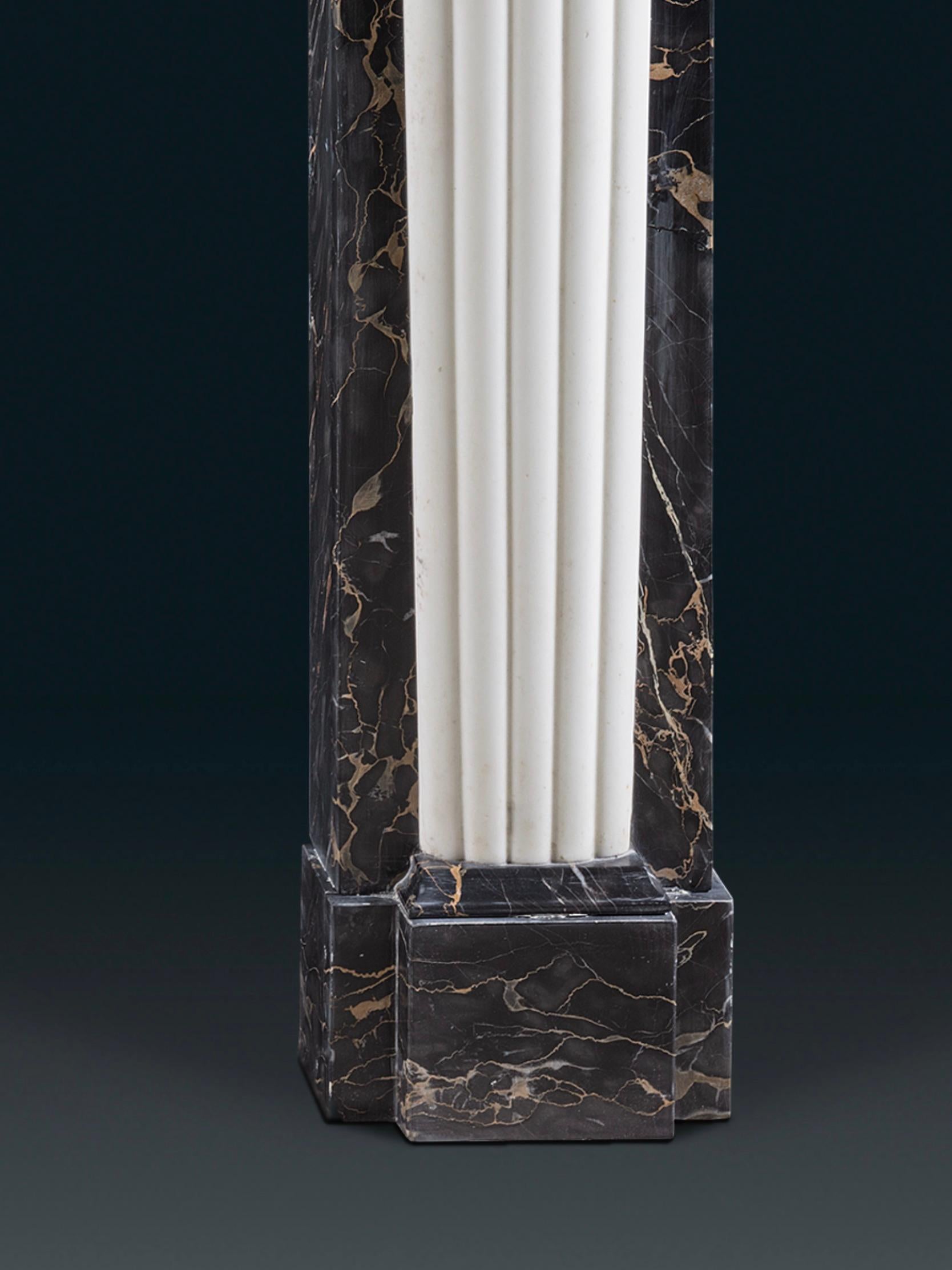 20th Century An Exceptional Regency Style Chimneypiece in Portoro Nero & Statuary Marbles For Sale