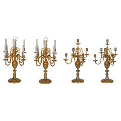 Un'eccezionale suite di candelabri in smalto champleve ormolu di Sevin, Barbedienne
