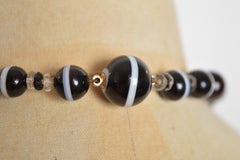 An Exceptional Victorian String of Black Banded Agate Beads - Long Necklace