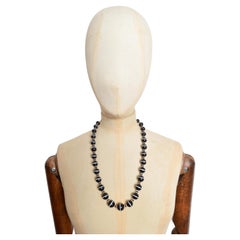 An Exceptional Victorian String of Black Banded Agate Beads - Long Necklace