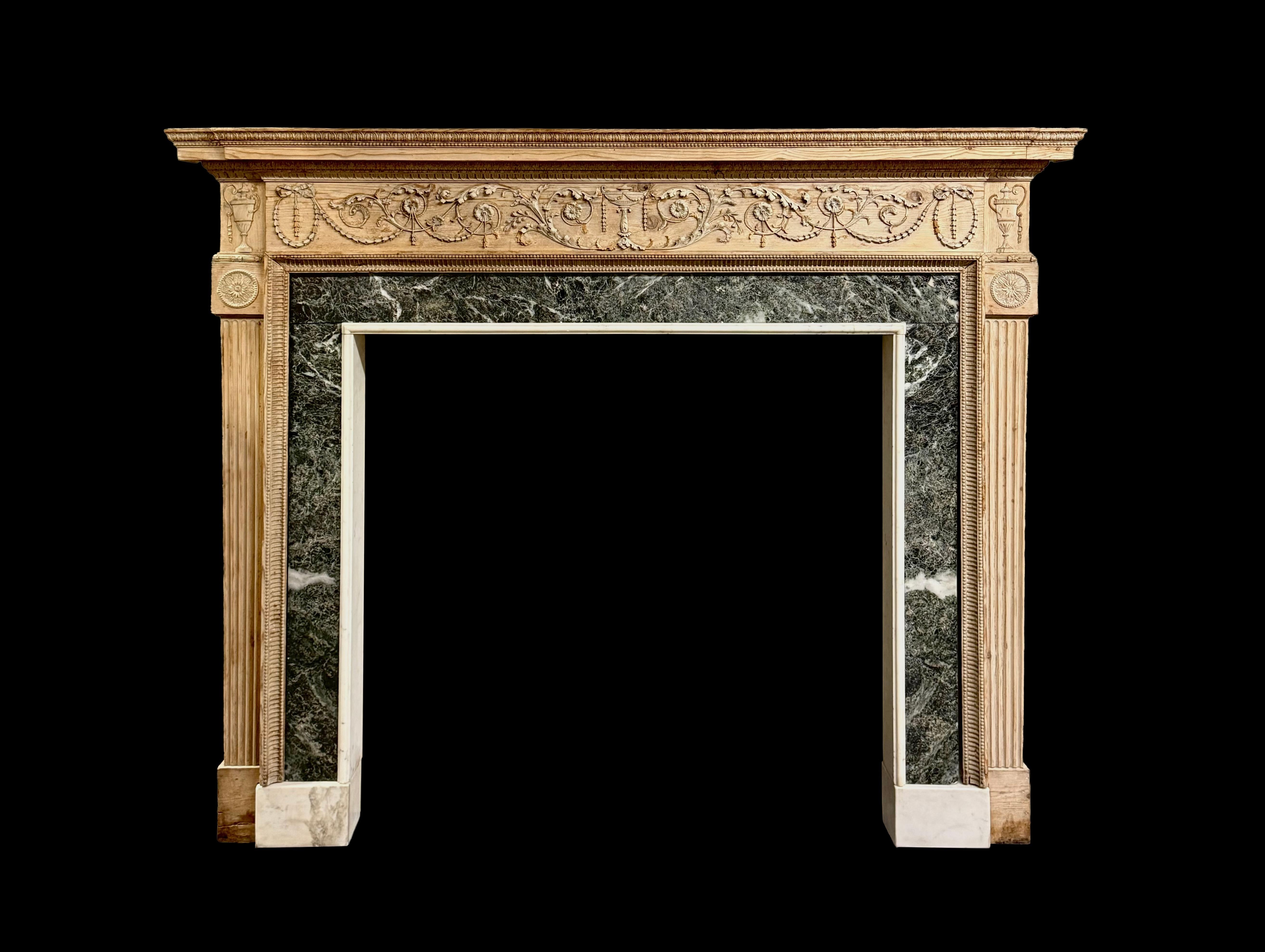 Hand-Carved An exceptionally fine Neo-classical pine chimneypiece with original Verde Antico For Sale