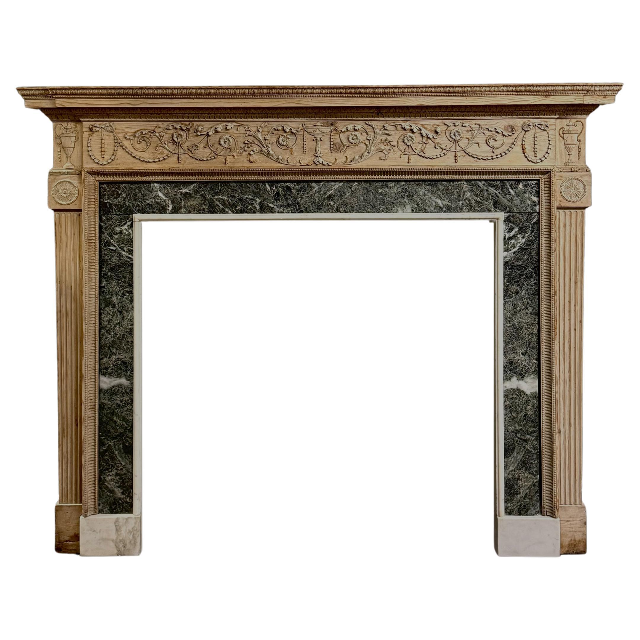An exceptionally fine Neo-classical pine chimneypiece with original Verde Antico For Sale