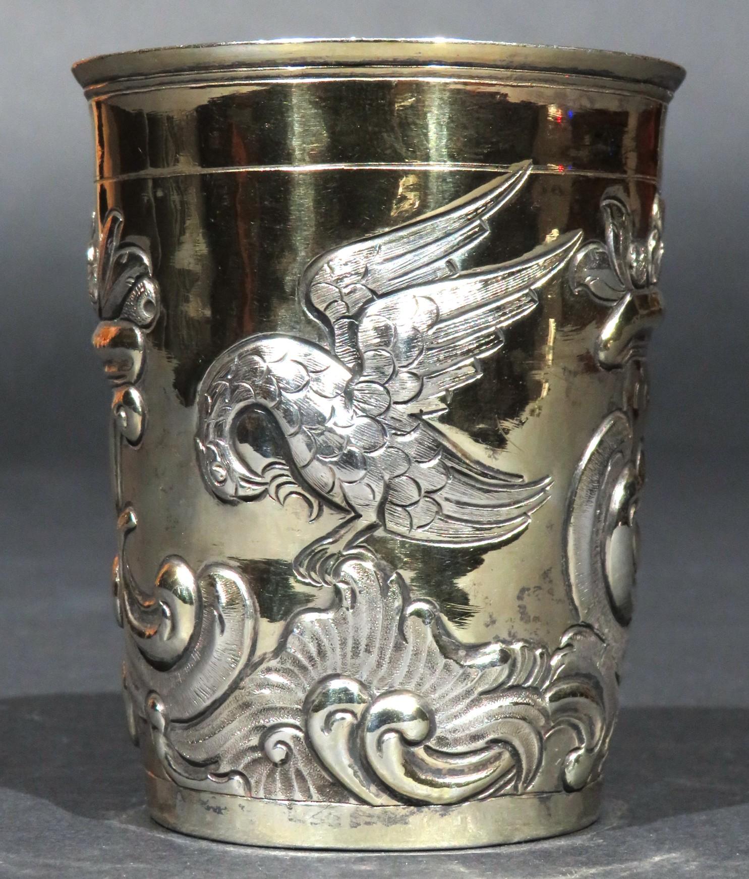 The richly embossed silver-gilt exterior surface exhibiting robust motifs of eagles perched upon leafy scrolls, flowerheads & foliate motifs, the interior exhibiting a fine gilt washed interior.  The underside of the base bearing impressed Moscow
