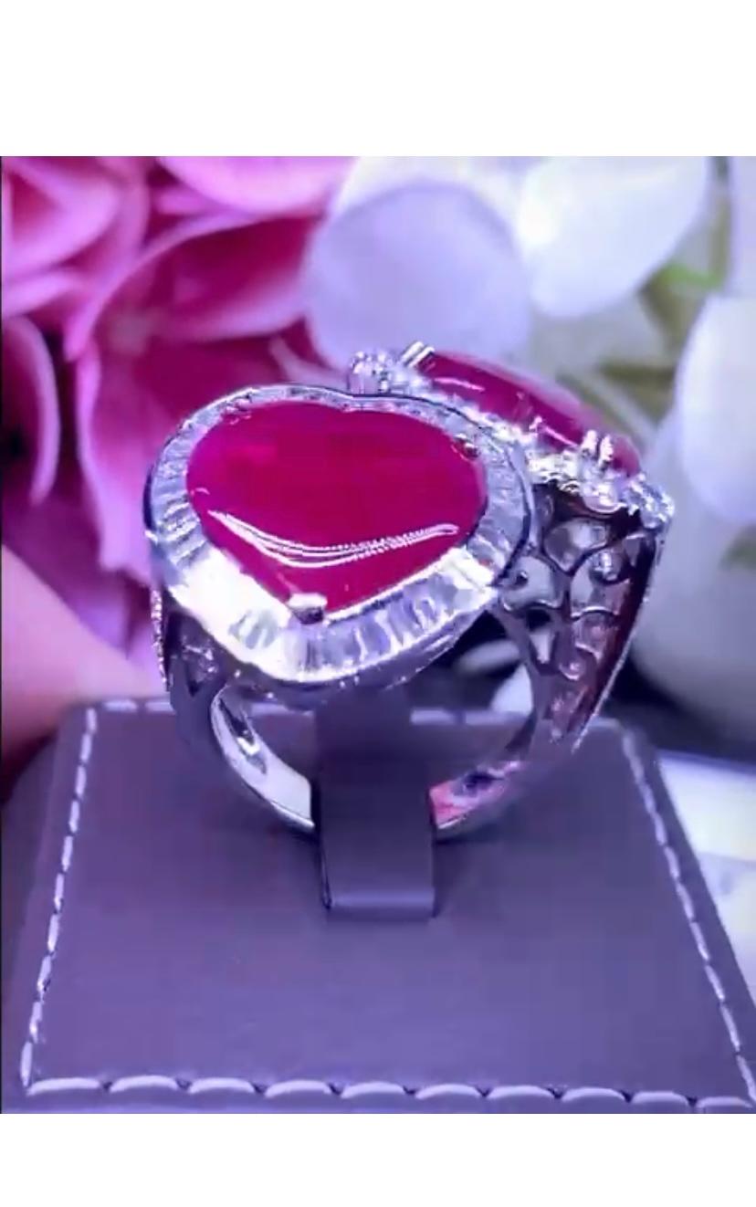 From love ❤️ collection, a magnificent double hearts design for this original ring with two pieces of Burma rubies of 8,20 carats and diamonds round brilliant and baguettes cut of 3,68 F/VS. 
Handcrafted by artisan goldsmith.
Excellent manufacture