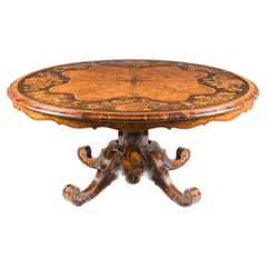 Magnifique table centrale en ronce de noyer et marqueterie du 19ème siècle