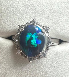 An Exquisite 2.35ct Australian Black Opal & Diamond Platinum Ring