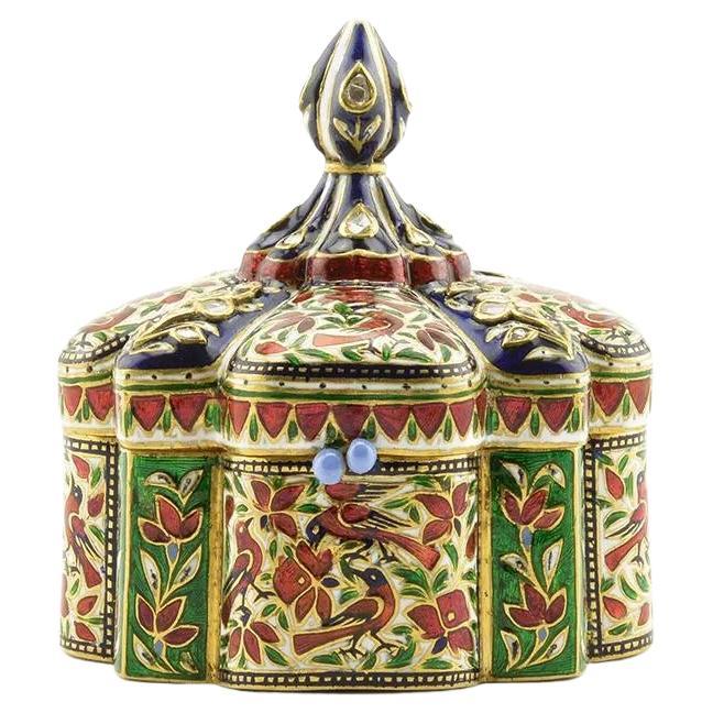 An Exquisite and Large Indian 22K Gold, Enamel, and Diamond Snuff Box, Jaipur

A very fine quality 22k gold box set with 40 diamonds, painted with the finest quality enamel made in Jaipur, India by master jewelers and enamelers. Shaped in the form
