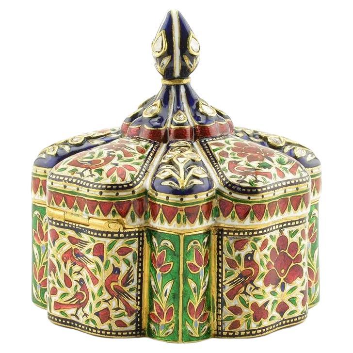An Exquisite and Large Indian 22K Gold, Enamel, and Diamond Snuff Box, Jaipur

A very fine quality 22k gold box set with 40 diamonds, painted with the finest quality enamel made in Jaipur, India by master jewelers and enamelers. Shaped in the form