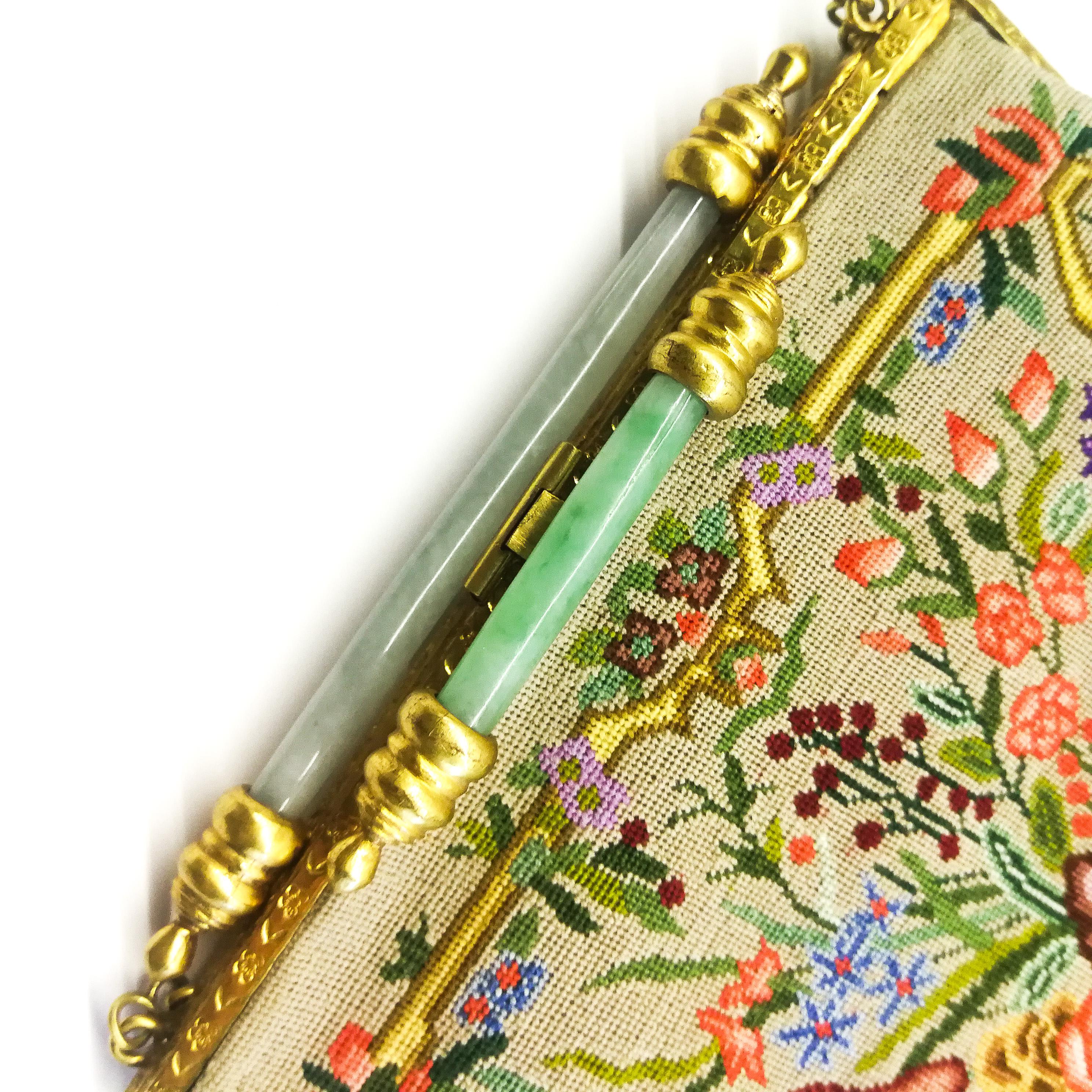 An exquisite Art Deco petit point bag, with a double jade bar clasp, 1920s. 1