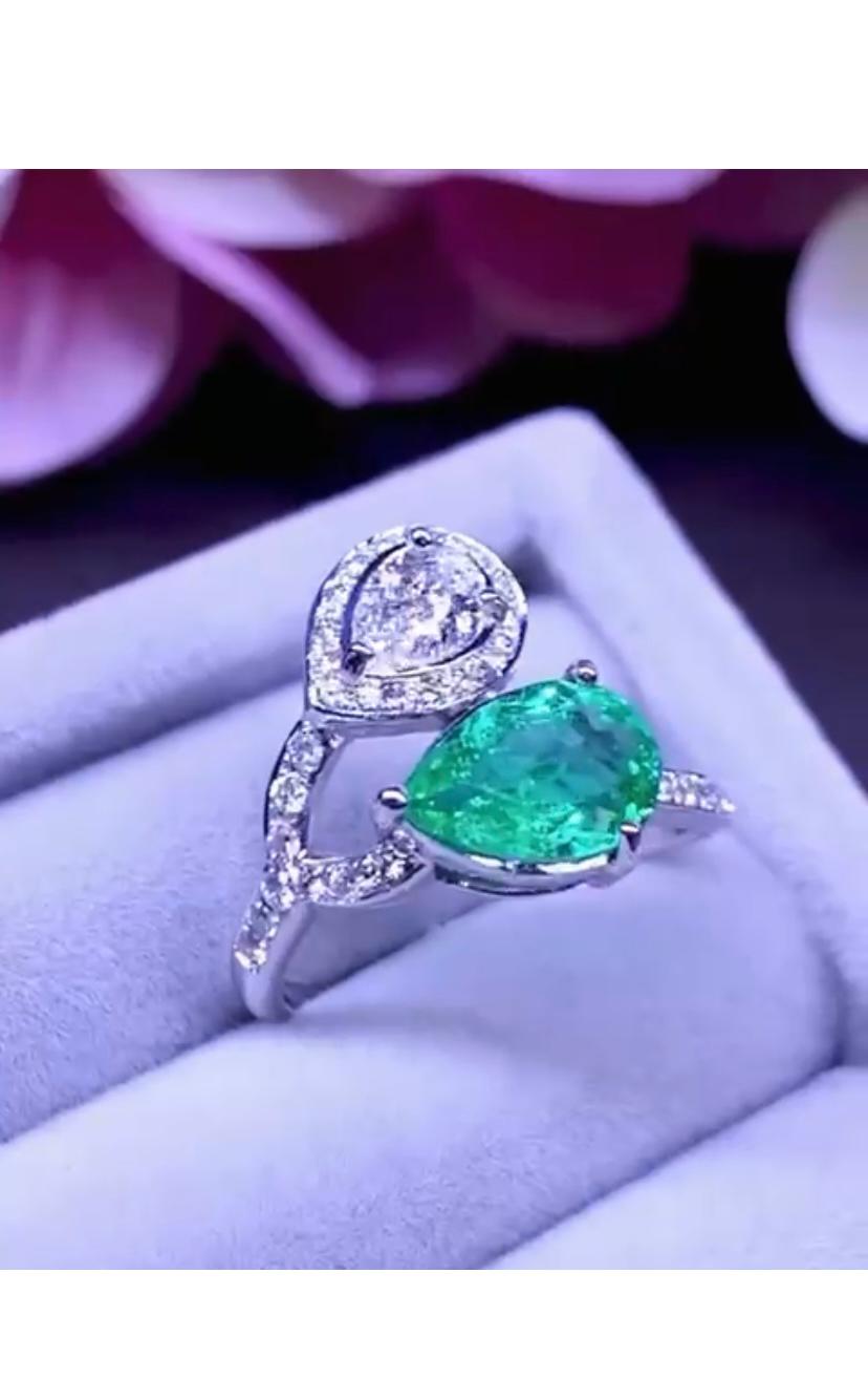 Pear Cut AIG Certified 1.50 Carats Colombia Emerald  GIA Certified .40 Ct Diamond Ring For Sale