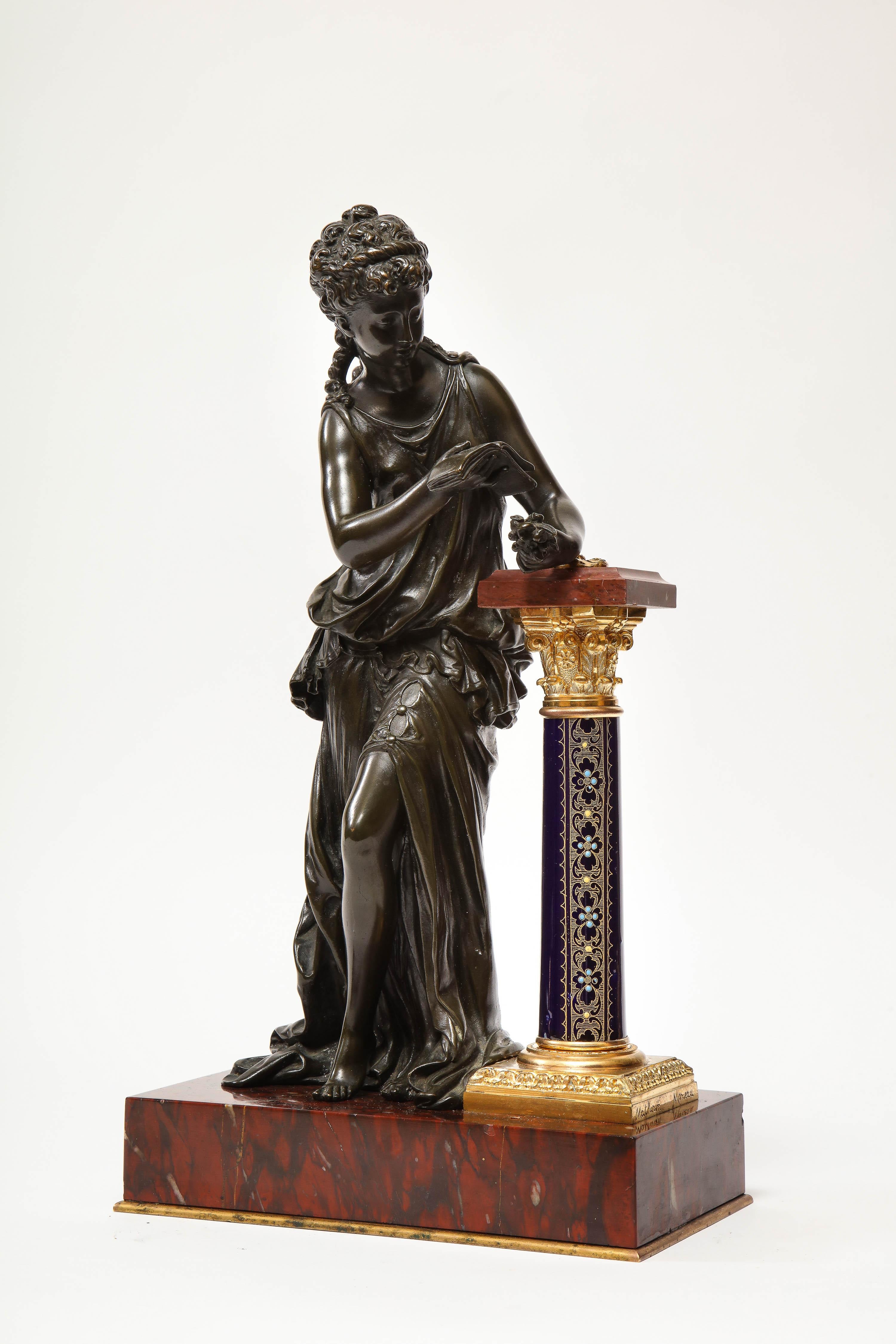 An Exquisite French gilt and patinated bronze sculpture of Venus, resting on a Sèvres style cobalt blue enameled porcelain pedestal, on rouge marble base, by Mathurin Moreau, circa 1880.

This sculpture is not an ordinary one. It's very rare,