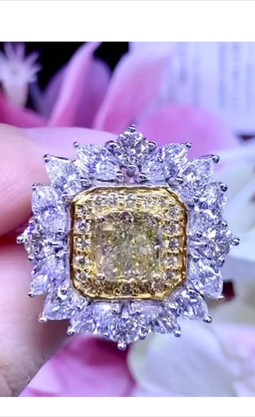Magnificent piece d’art in 18k gold with cushion cut fancy brownish yellow diamond ct 2,01 and around diamonds, marquise and round brilliant cut diamonds ct 3,30 F/VS-VVS .
Handmade jewels by artisan goldsmith.
Excellent manufacture and
