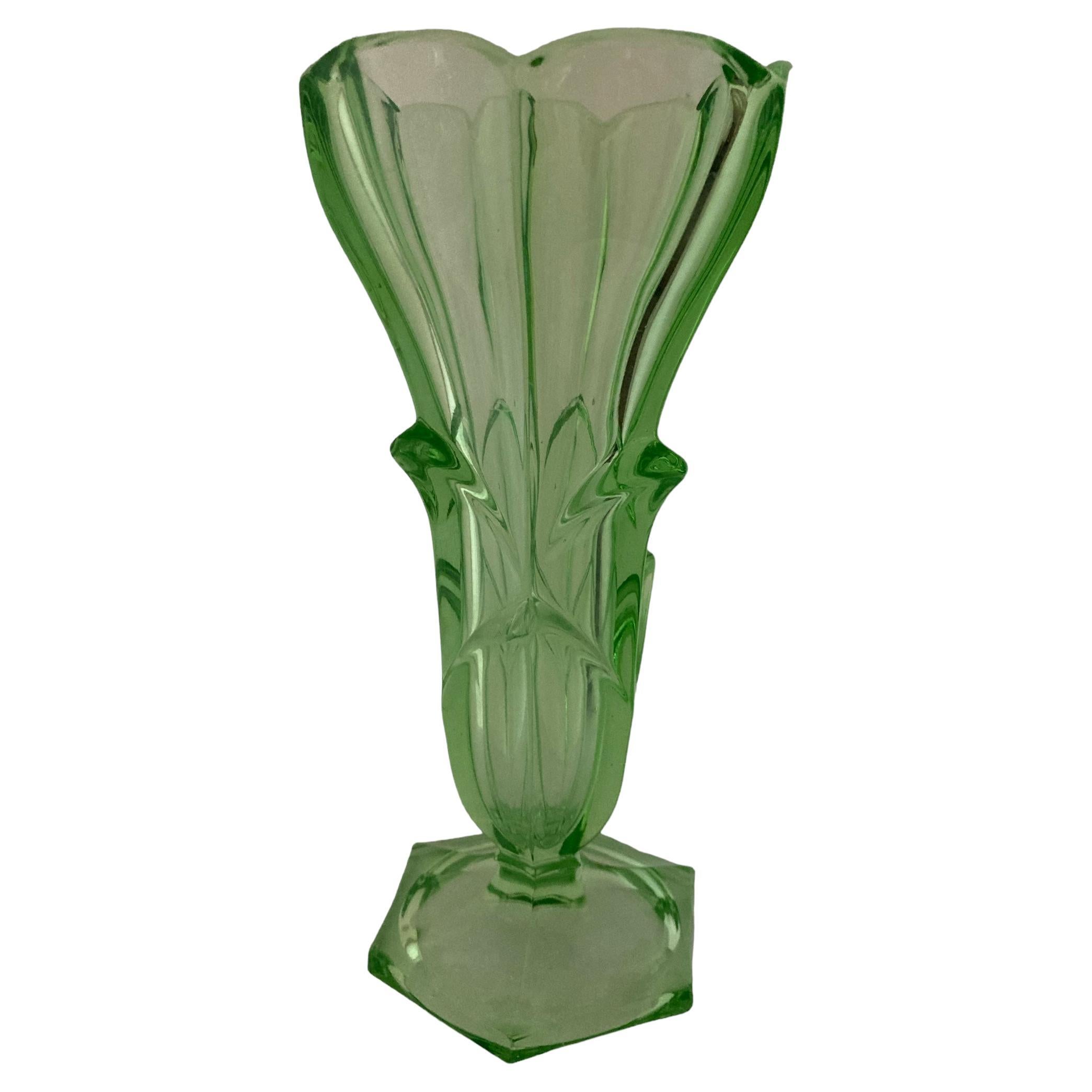 An exquisite green uranium glass vase with a captivating flower design For Sale