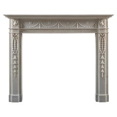 An Exquisite Neoclassical Chimneypiece in White Statuary Marble