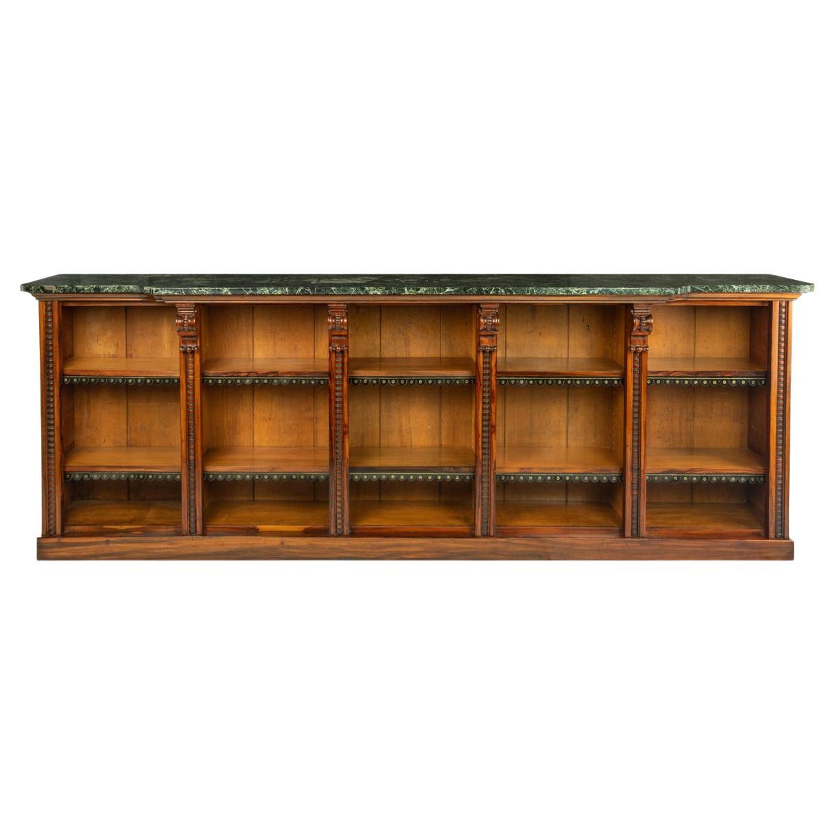 An extensive William IV Goncalo Alves breakfront open book case For Sale