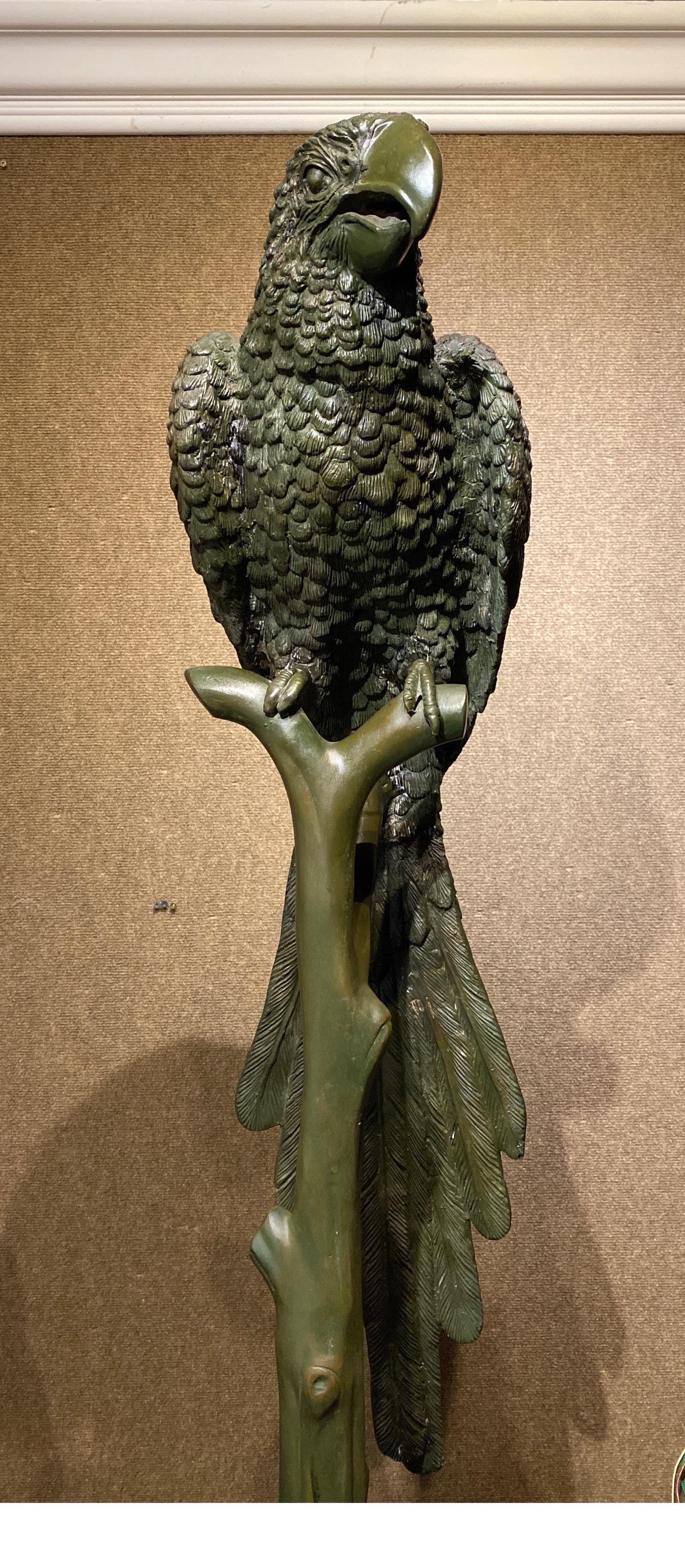 An extraordinary bronze pair of male & female parrots on branches, circa 1900. 

Austrian exquisite parrots blended to create a light and dark green patina finish. Standing over 51