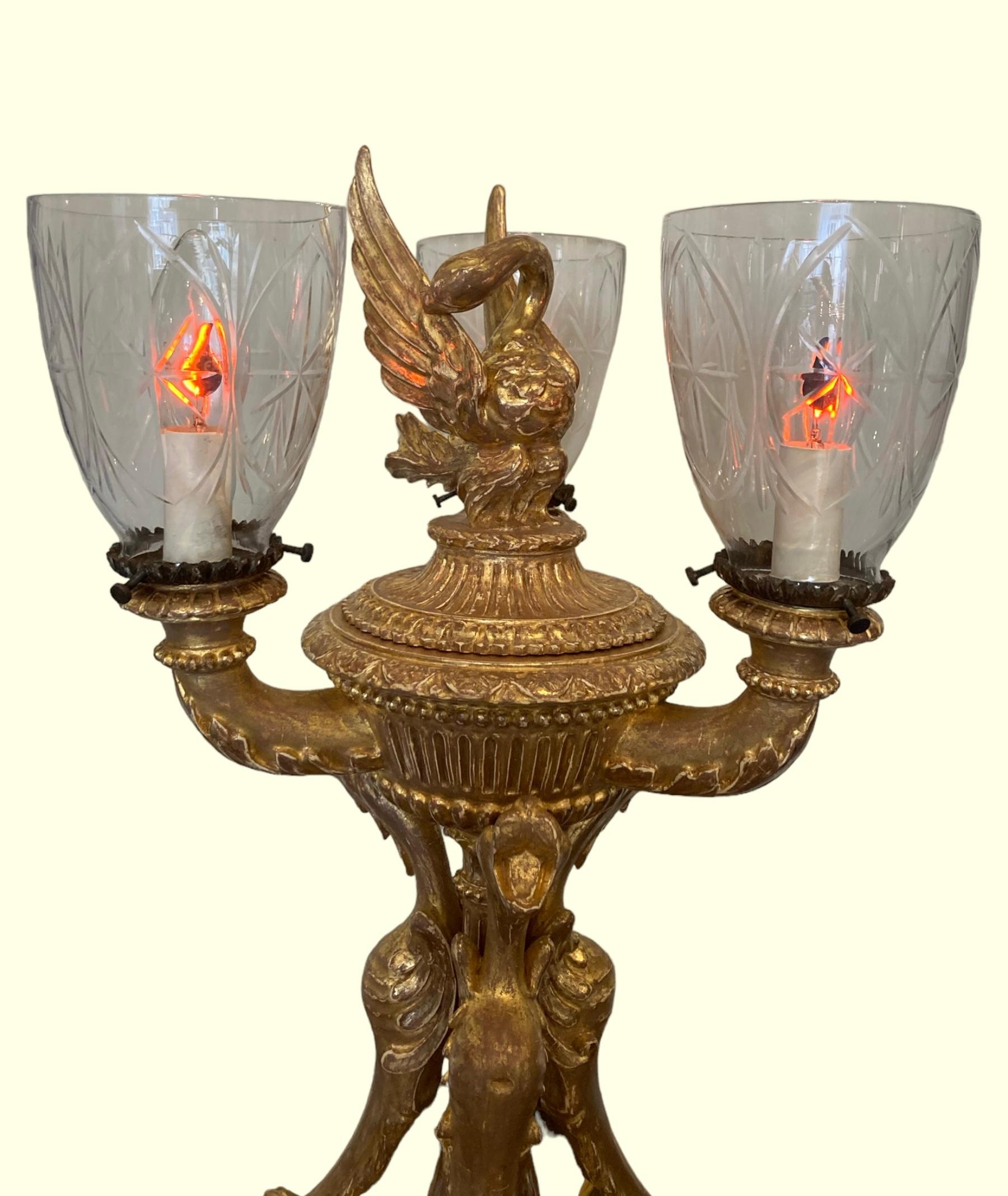Italian An extremely decorative giltwood three light table lamp For Sale