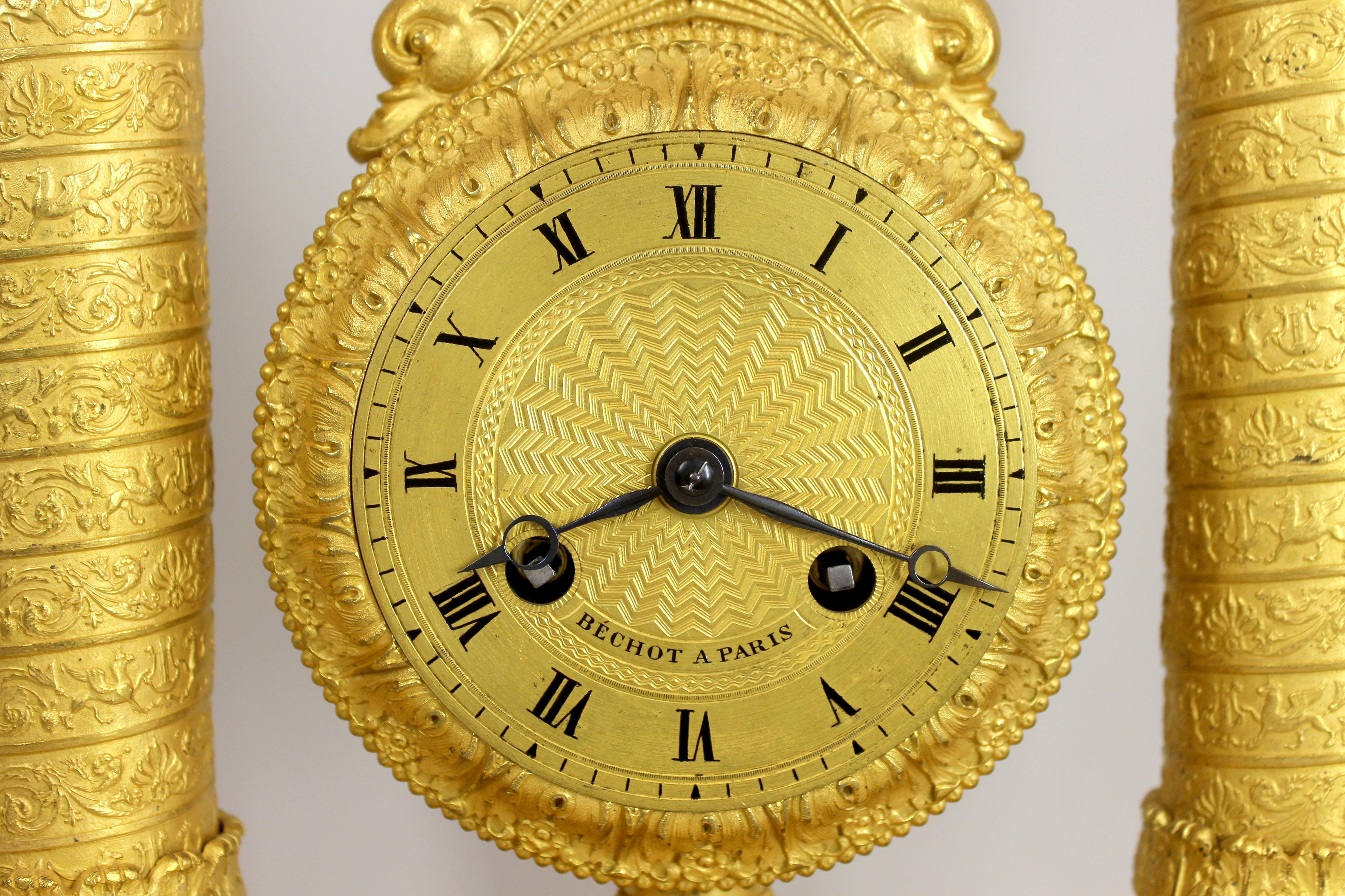 This extremely rare swinging portico clock by Béchot Paris, in an ormolu case of exquisite quality, finely cast and gilded with its original burnished and chased finish, this clock is very rare with other examples made in wood or marble.

The clock