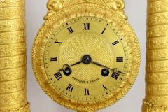 An Extremely Fine Ormolu Portico Mystery Clock