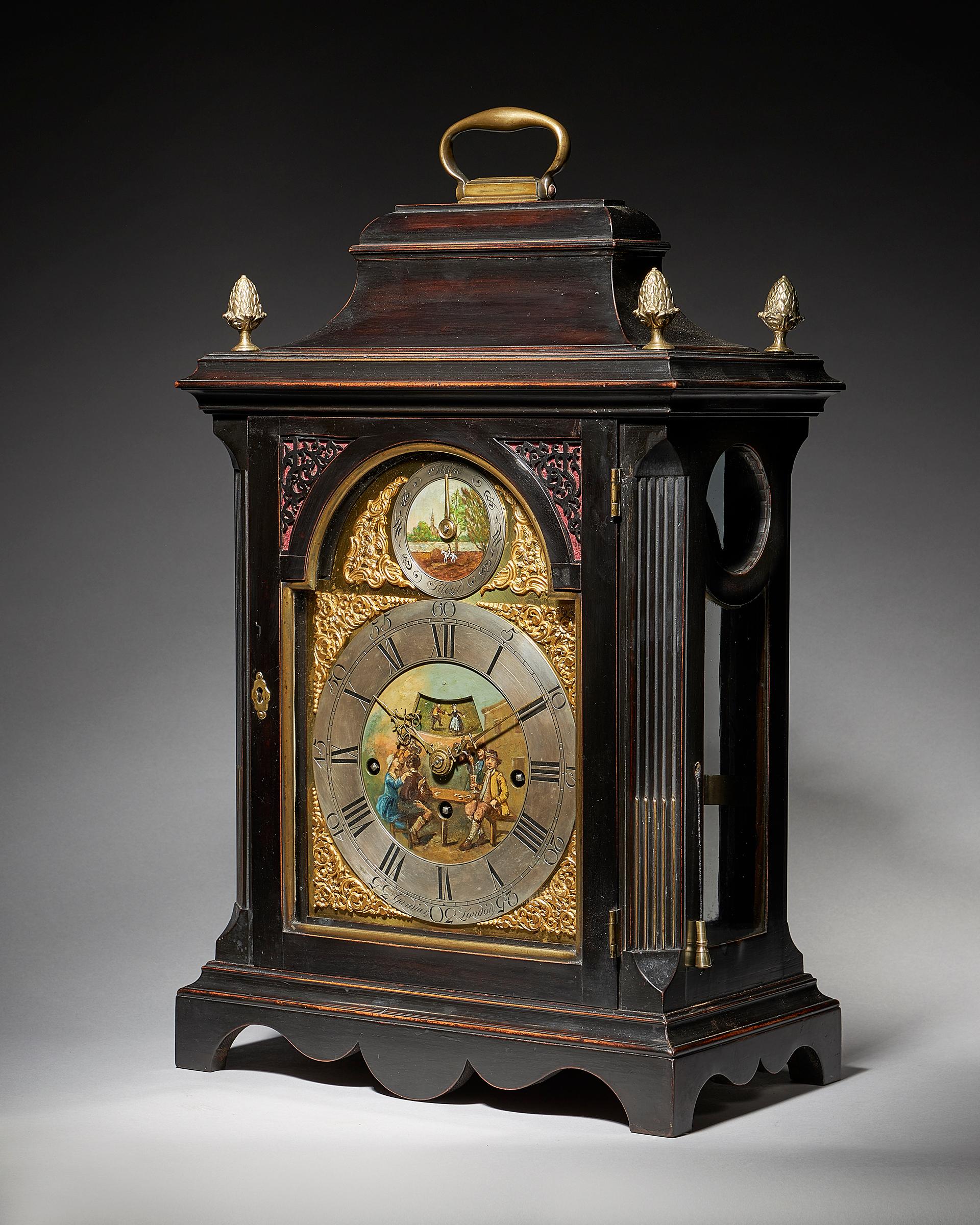 An extremely rare George III 18th century ebonized quarter-striking bracket clock by Thomas Gardner, London, circa 1760.

A fantastically rare and intricate bracket clock paying homage to merriment. The dial is elaborately decorated with drinking