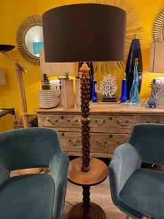 An French 1940s brutalist oak floor lamp attributed to Charles Dudouyt