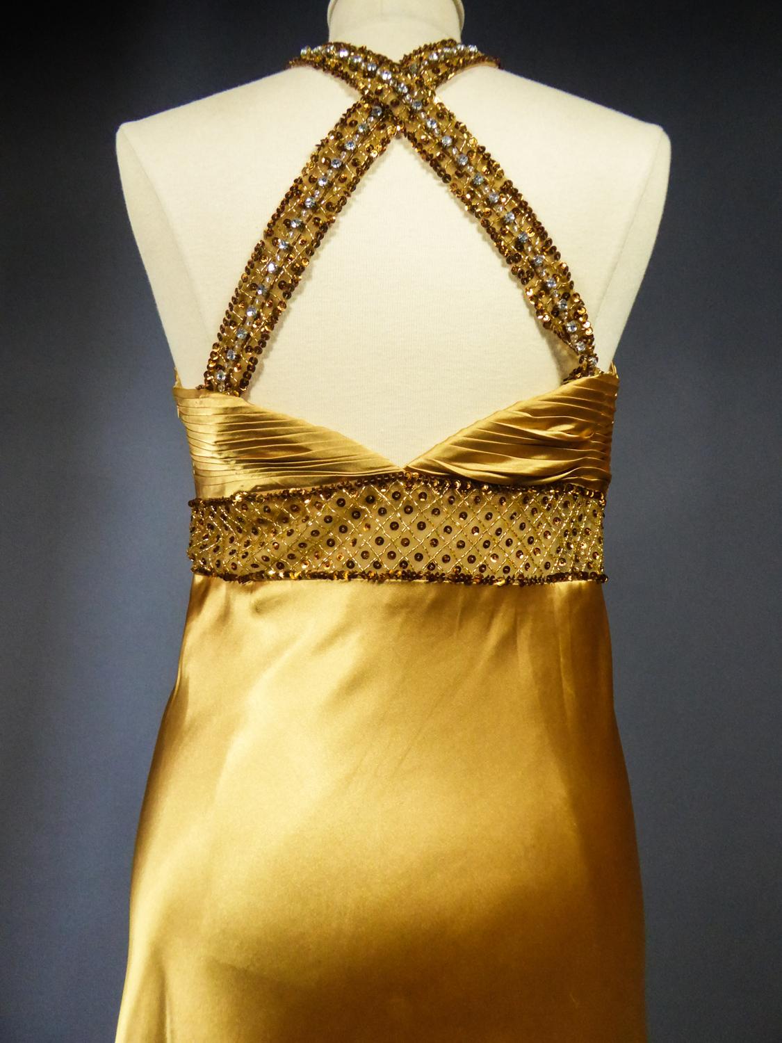 An French Evening Gown in Gold Embroidered Satin with Sequins Circa 1980 5