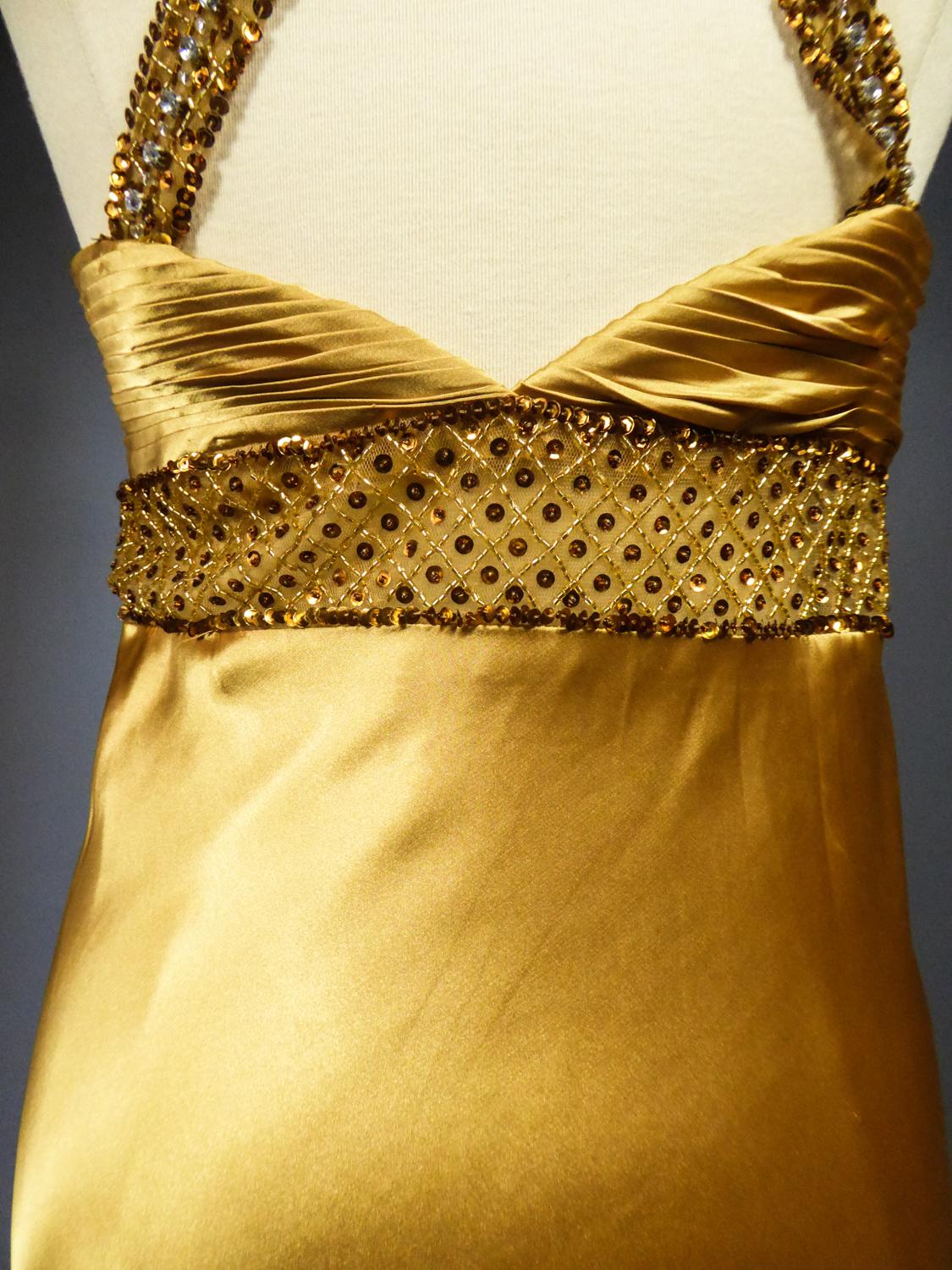 An French Evening Gown in Gold Embroidered Satin with Sequins Circa 1980 7