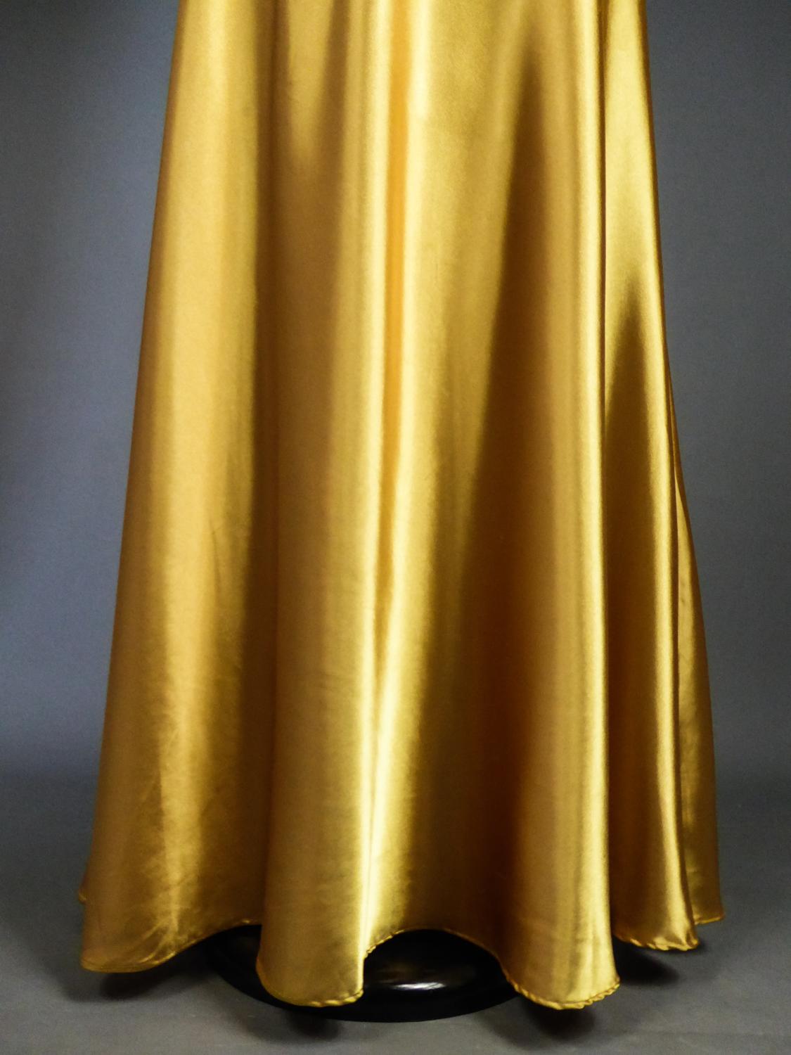 An French Evening Gown in Gold Embroidered Satin with Sequins Circa 1980 In Good Condition In Toulon, FR