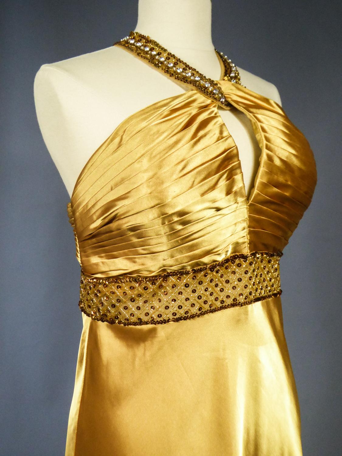 An French Evening Gown in Gold Embroidered Satin with Sequins Circa 1980 1