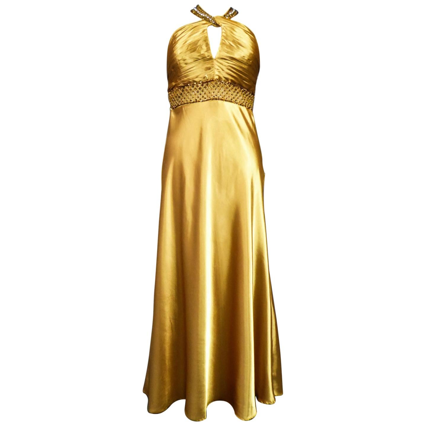 An French Evening Gown in Gold Embroidered Satin with Sequins Circa 1980