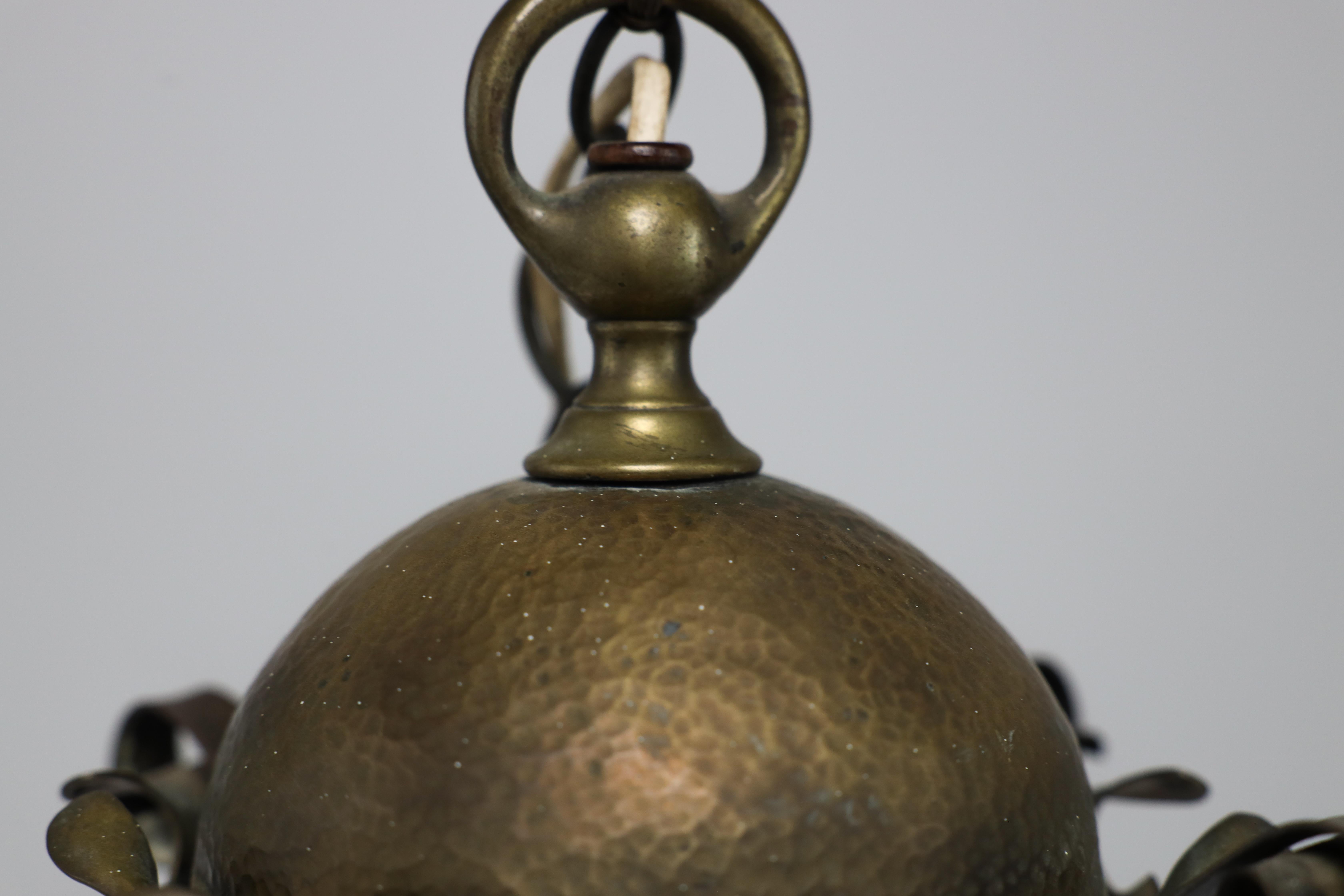 An Arts & Crafts hammered brass lantern with original opaque ribbed glass liner. In Good Condition For Sale In London, GB
