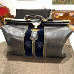 An High Quality 1970s Leather Velvet and Brass Duffel bag by Roberta di Camerino