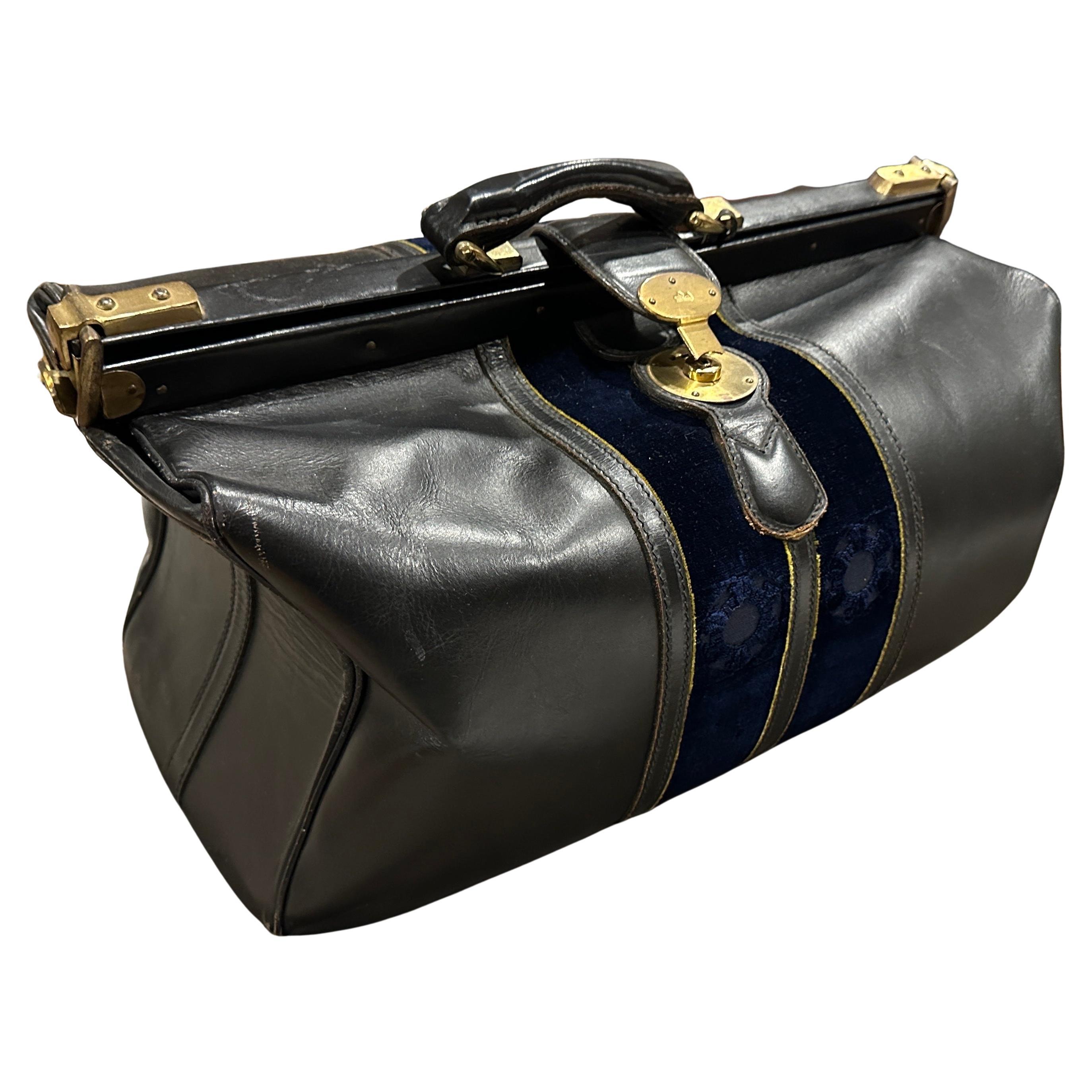 An High Quality 1970s Leather Velvet and Brass Duffel bag by Roberta di Camerino For Sale