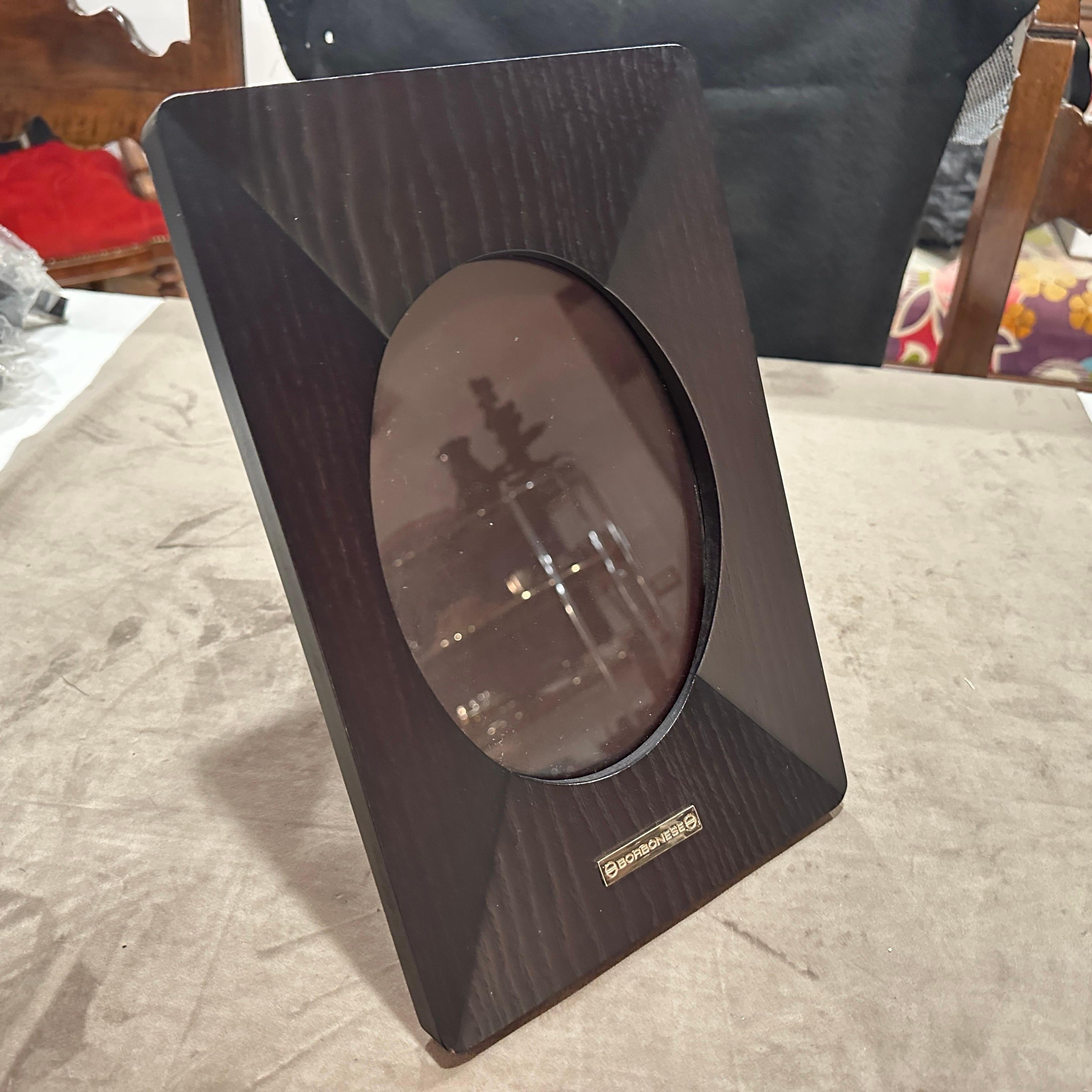 High Quality 1990s Modern Wood Italian Picture Frame by Borbonese
Elevate your cherished memories with this exquisite 1990s modern picture frame by the renowned Italian luxury brand, Borbonese. Crafted with an unparalleled commitment to quality,