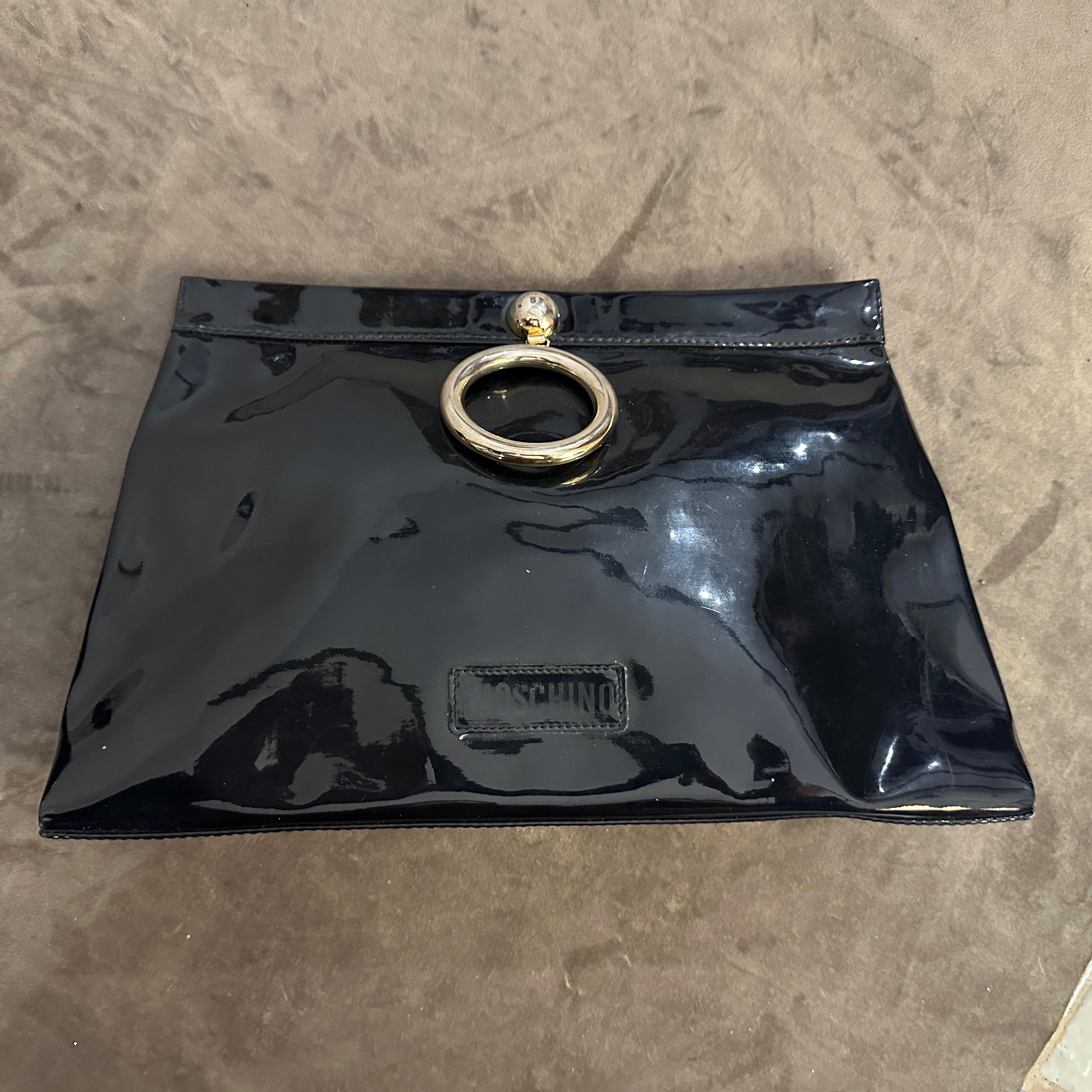 An Iconic 1980s Franco Moschino Blue Plastic and Brass Hand Bag For Sale 4