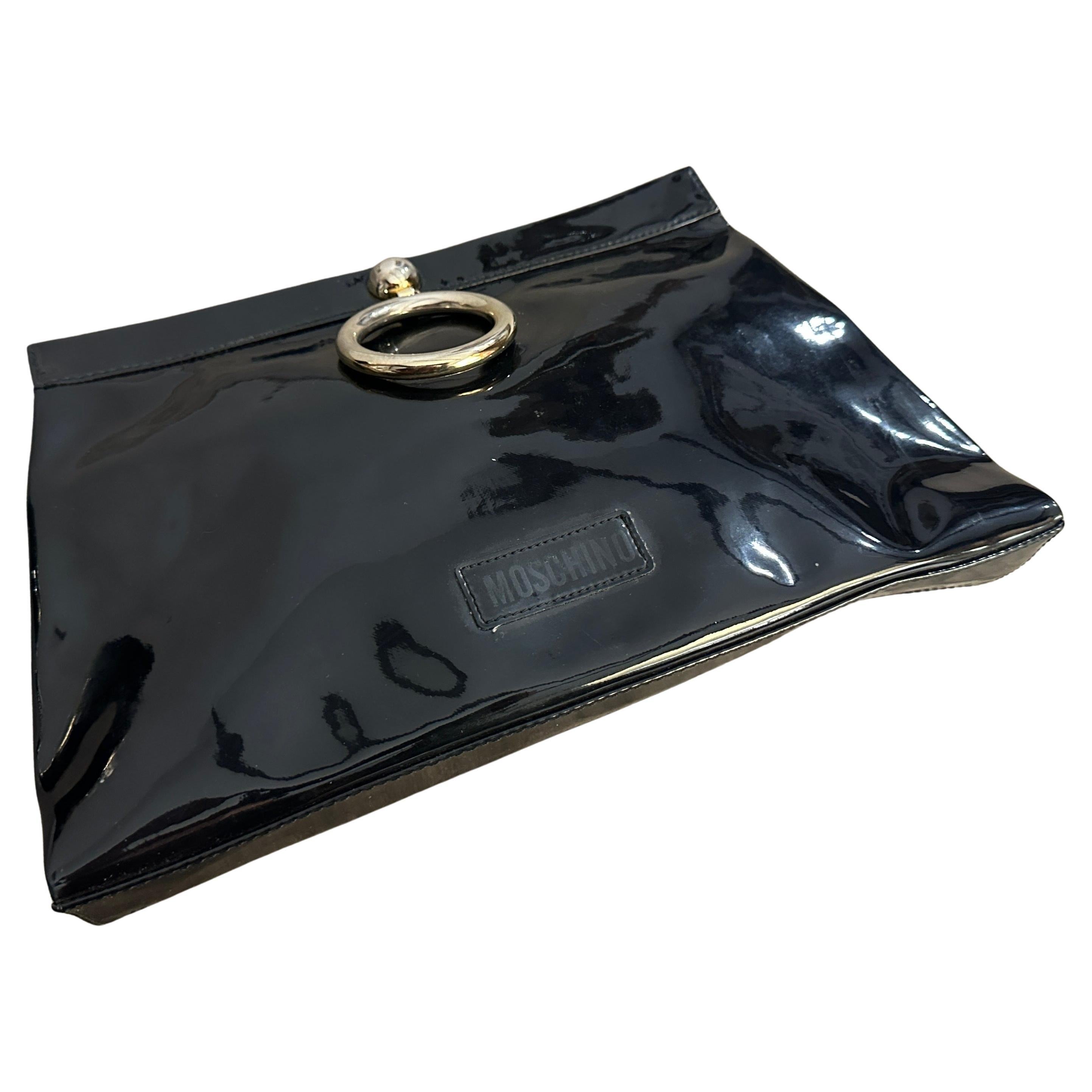 An Iconic 1980s Franco Moschino Blue Plastic and Brass Hand Bag For Sale