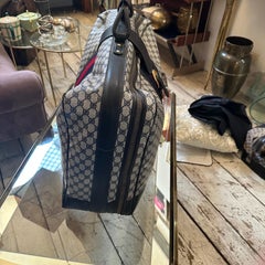 Un'iconica borsa da viaggio in tela Monogram vintage di Gucci degli anni '80