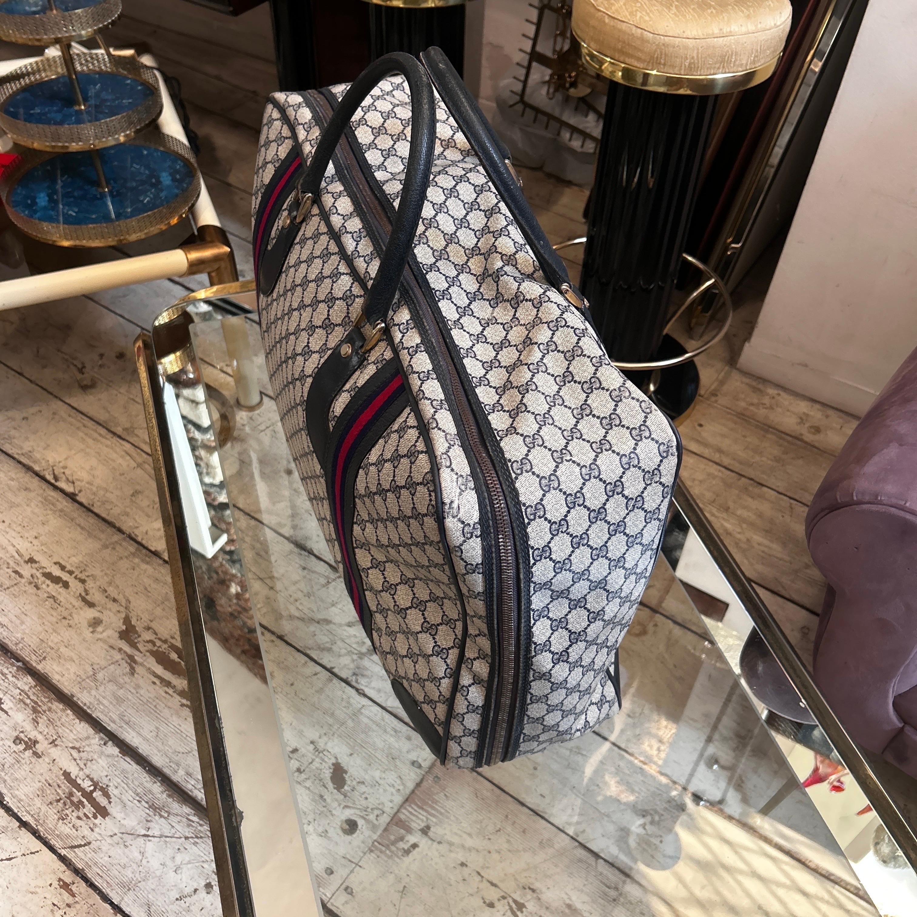 Women's or Men's An Iconic 1980s Gucci Vintage Monogram Canvas Travel Bag For Sale