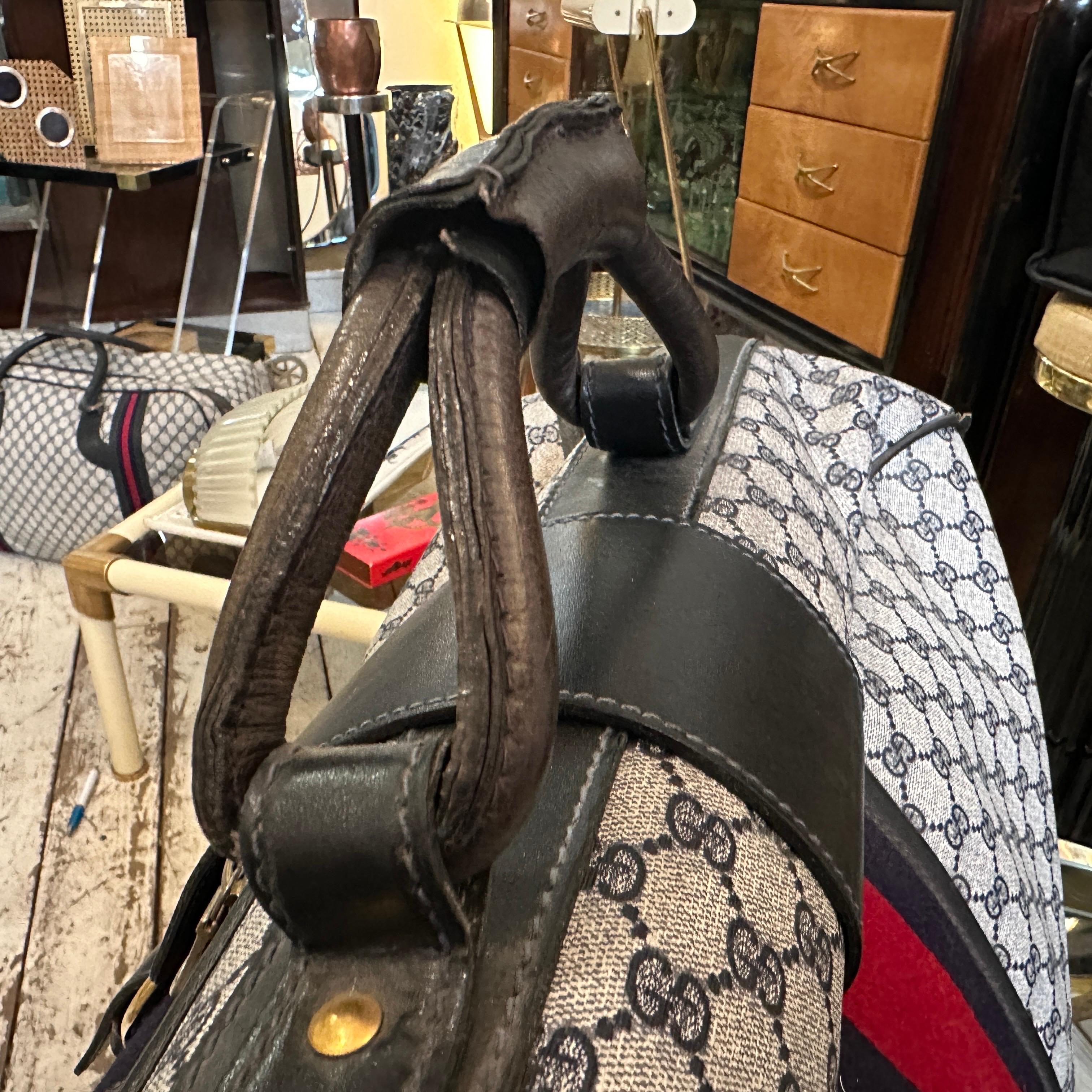 An Iconic 1980s Gucci Vintage Monogram Canvas Travel Bag 1
