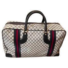 An Iconic 1980s Gucci Vintage Monogram Canvas Travel Bag