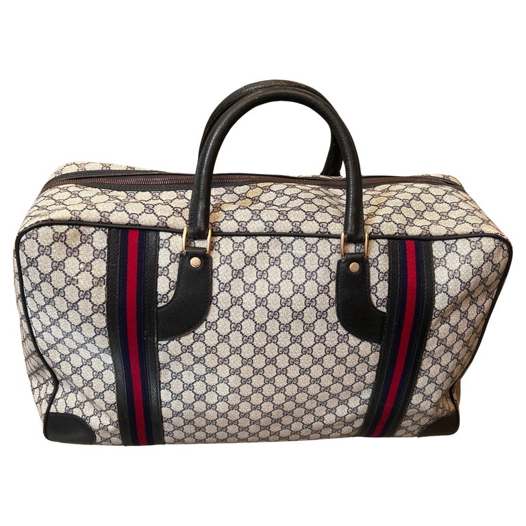 An Iconic 1980s Gucci Vintage Monogram Canvas Travel Bag For  display picture 1