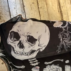 An Iconic Black Silk Scarf with double Skull by Alexander McQueen