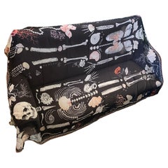 An Iconic Black Silk Scarf with double Skull by Alexander McQueen