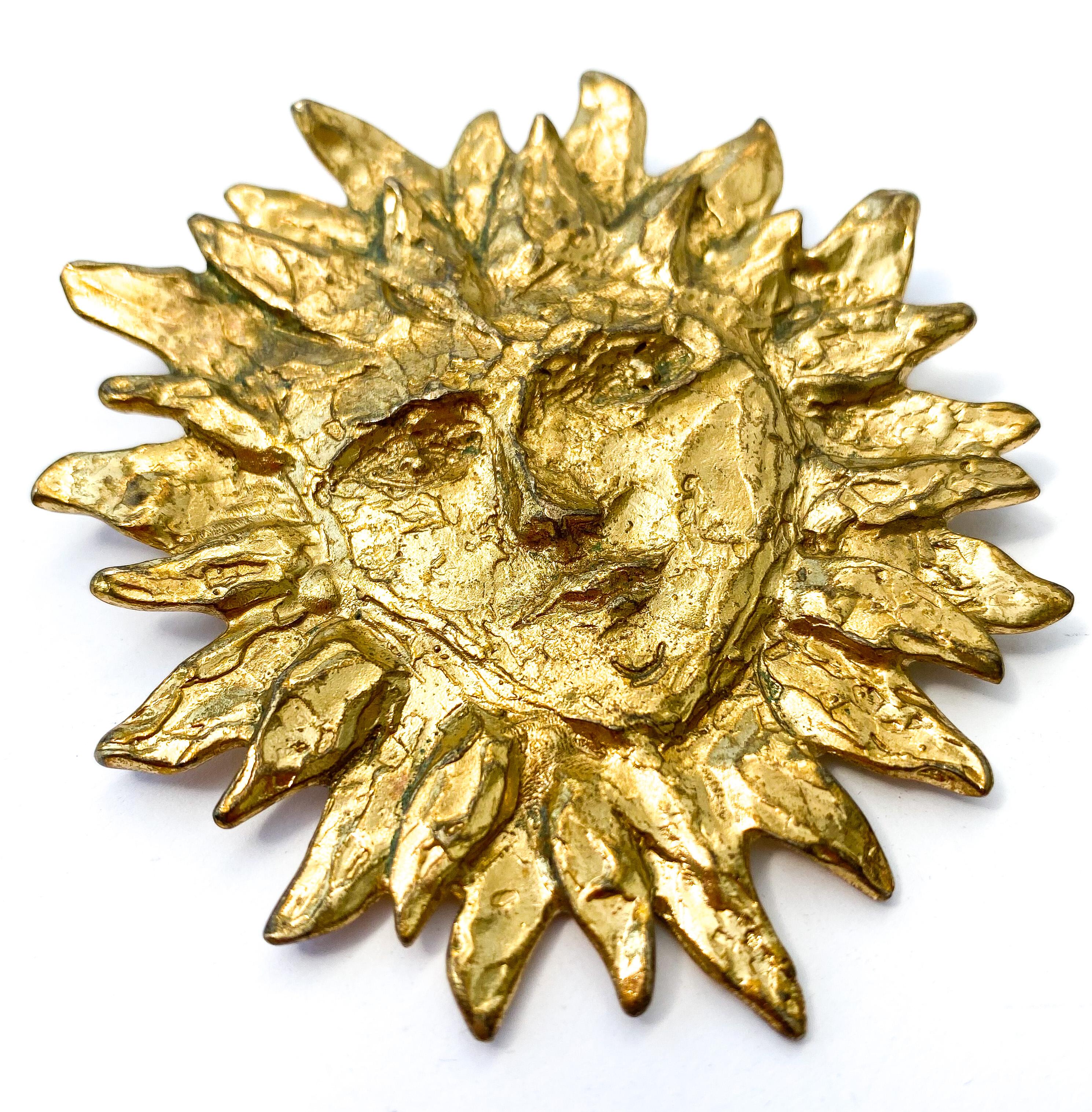 An iconic brooch from Yves Saint Laurent in the 1980s, a familiar and popular design justifiably so. Hand carved then cast in gilded metal by Maison Goossens for YSL, designed by Loulou De La Falaise, Yves Saint Laurent's muse and jewellery designer